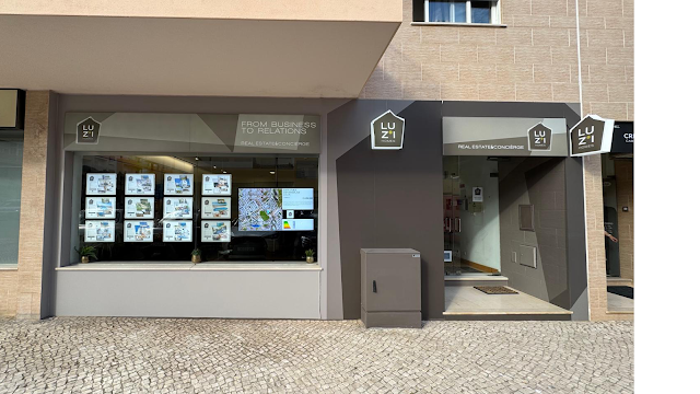 LUZI HOMES REAL ESTATE & CONCIÈRGE